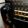 <p style='text-align: left; margin-bottom: -10px;'>Original state of the switchboard that eventually became the sequencer.  For more details on the original switchboards and their transformation, explore the  section of this page.</p><br>Photo by Seze Devres